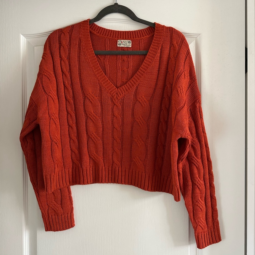 Women’s orange crop top sweater